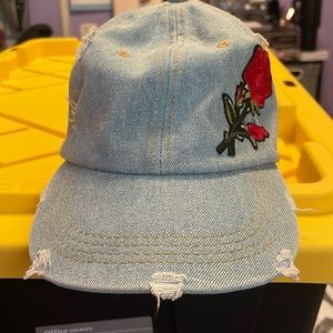 Distress denim hat with flower patch